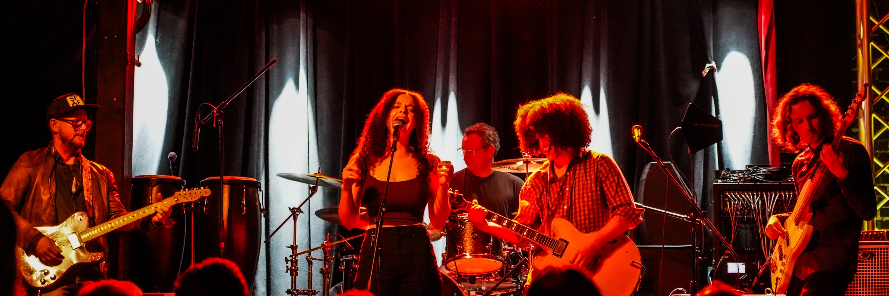 Don't Tell John performing