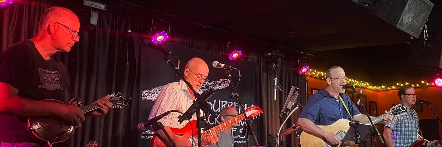 Dave Finney & The Procrastinators performing